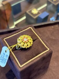Gold Floral Ring with Ruby Center Stone – Suhagan Abhushan